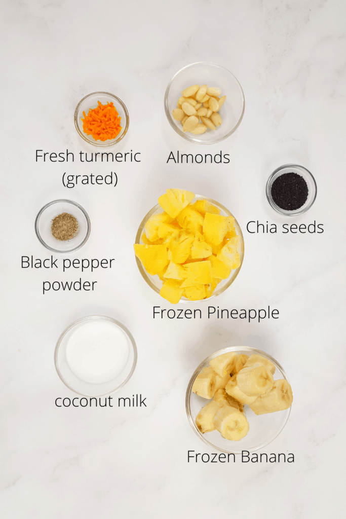 Fresh turmeric tropical smoothie bowl